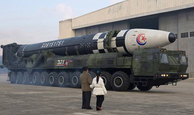 North Korean leader Kim Jong Un and Kim Ju-ae check out their enormous cache of missiles. Credit: UPI / Alamy 