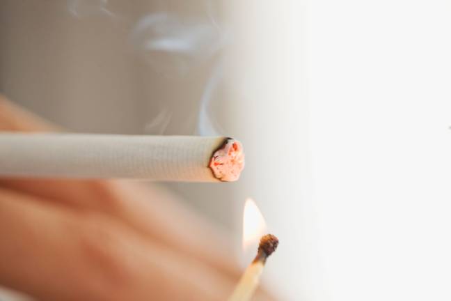 An episode of MythBusters proved that a cigarette could not light gasoline. Credit: Image Source/Alamy Stock Photo