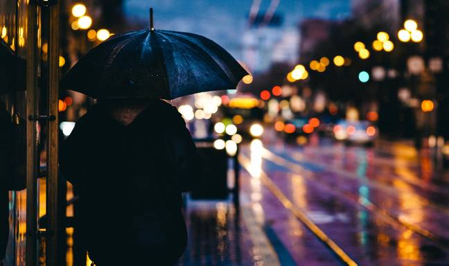 Person with umbrella (Pixabay)