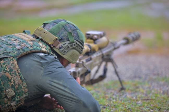 Snipers must complete a mission simulation before they can enter combat. Credit: APFootage/Alamy Stock Photo