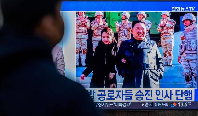  North Korean leader Kim Jong Un and his daughter on KCNA. Credit: Zuma Press Inc/Alamy.