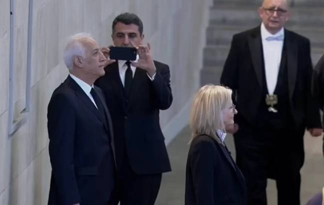 The Armenian president appeared to break protocol when he was seen posing for a picture inside Westminster Hall. Credit: BBC