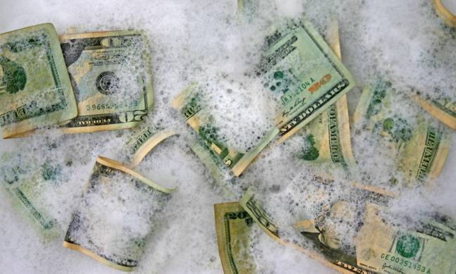 An image on Gary's phone of him in a bathtub full of money alerted officials to his sudden influx of cash. Credit: EyeEm/ Alamy Stock Photo