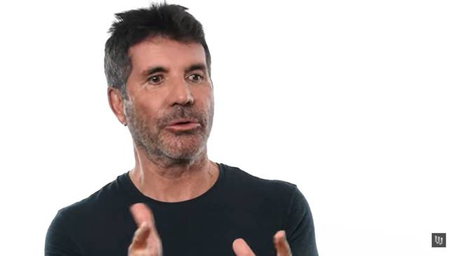 Simon Cowell explained how he got fired from his first job. Credit: Wired/YouTube