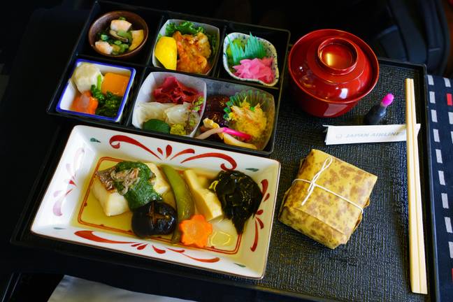 A meal served in First Class on a Japan Airlines flight, but passengers can now opt out of having a meal as part of their journey. Credit: EQRoy / Alamy Stock Photo