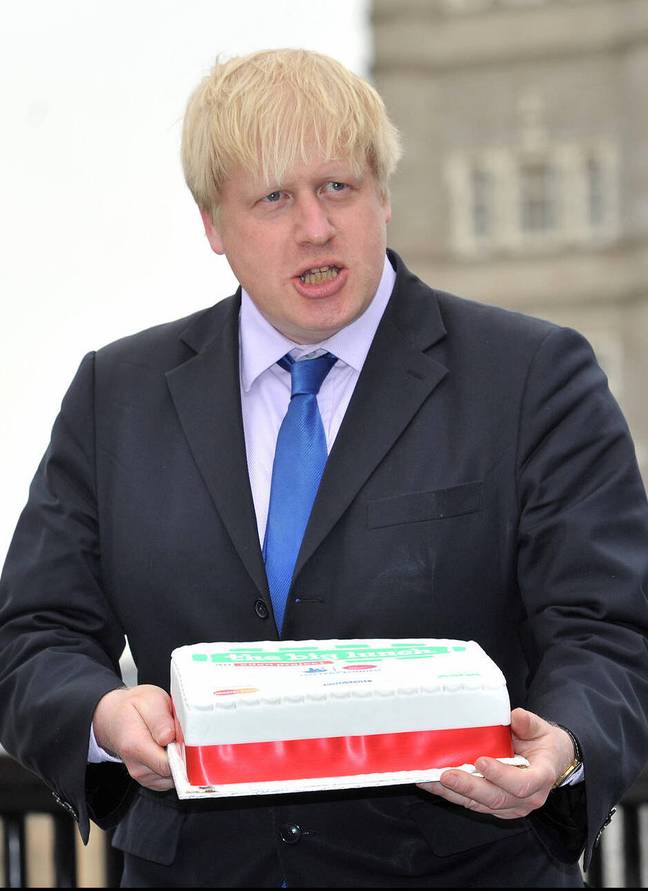 Boris Johnson with a cake (Alamy)
