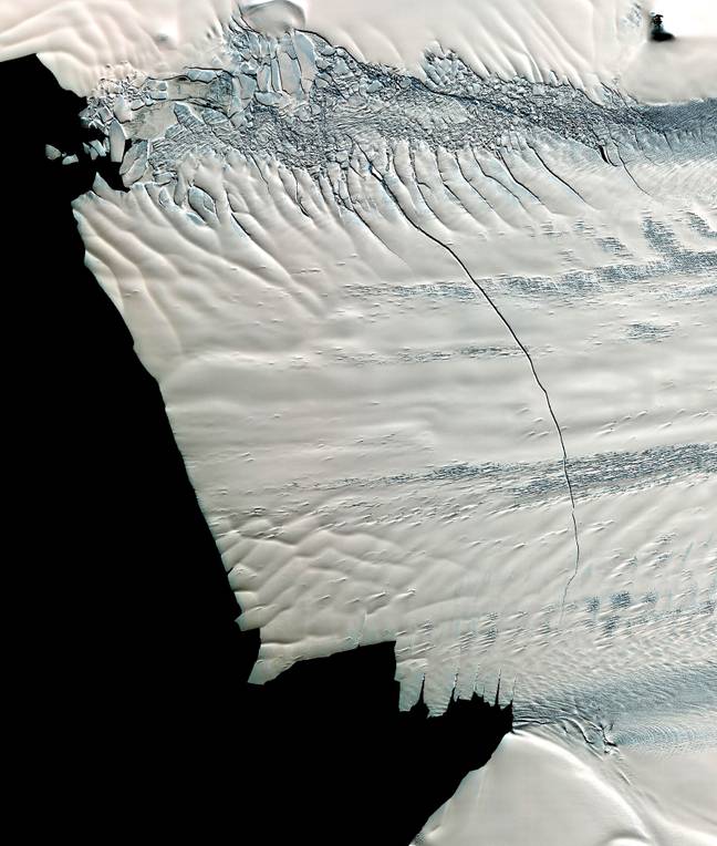 Photography from NASA has shown massive cracks appearing in the glacial ice. Credit: NASA Archive / Alamy Stock Photo