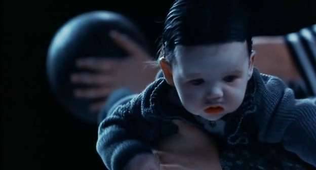 Yes, it's a baby with a moustache. Credit: Paramount Pictures