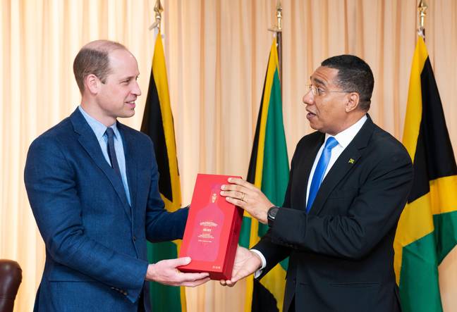 Prince William was gifted a bottle of rum during his meeting with Prime Minister Holness. Credit: Alamy