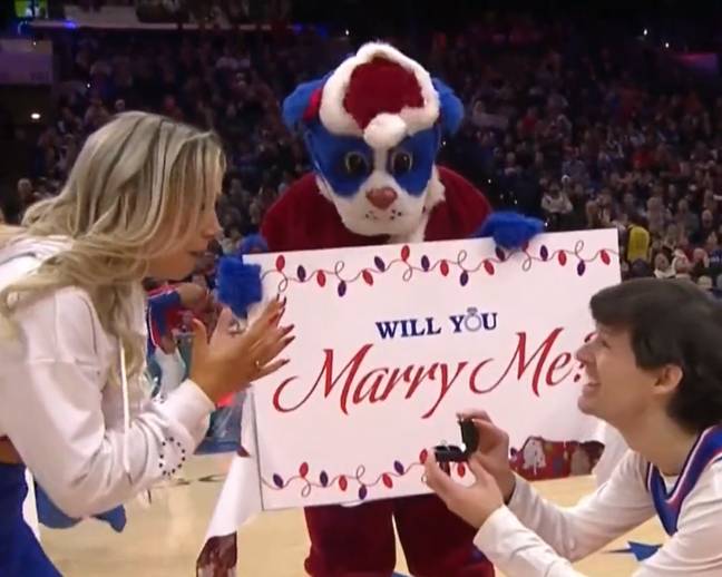 The man shocked his girlfriend with a proposal. Credit: @espn/Twitter