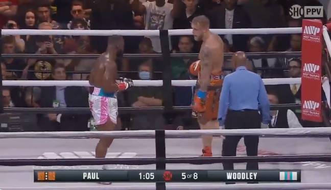 Woodley and Paul during the first fight. Image: Showtime 