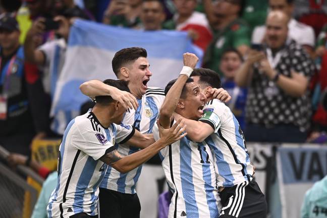 Argentina players celebrate their win over Mexico. (Image Credit: Alamy)