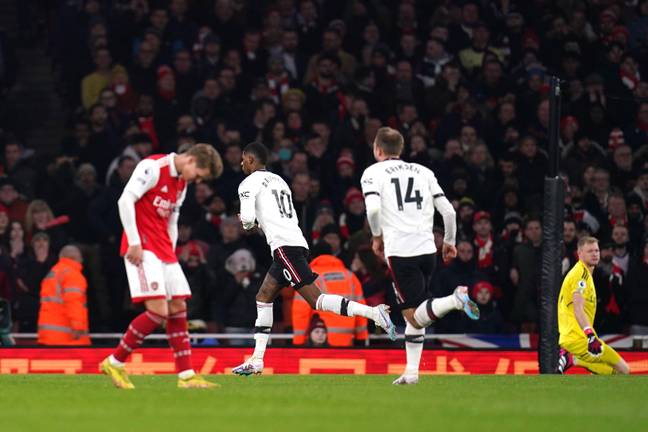 Marcus Rashford wheels away in celebration after scoring against Arsenal. Image: Alamy 