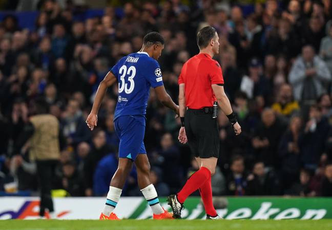 Chelsea's Wesley Fofana leaves the game with an injury during the UEFA Champions League Group E match. (Alamy)