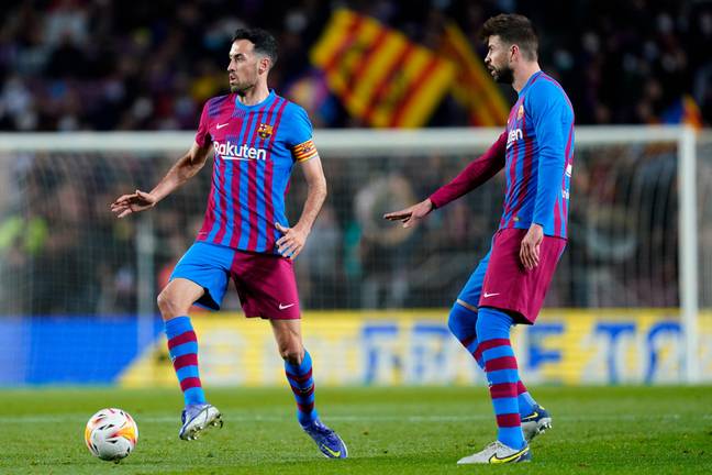 Sergio Busquets (left) is Barcelona's current captain, with Gerard Pique (right) vice-captain (Image: Alamy)