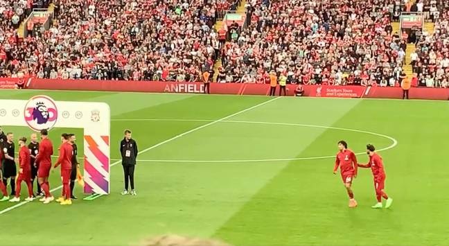 Salah got Alexander-Arnold back in the game, and fans in the stands chuckled. (Image Credit: FunnyFTMoments/Twitter)