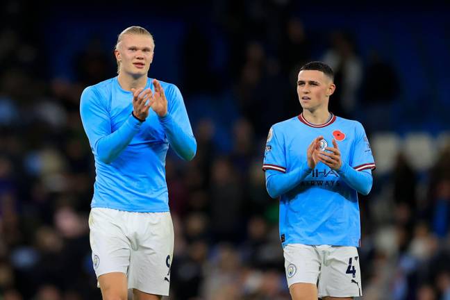 Erling Haaland and Phil Foden of Manchester City celebrate the 2-1 victory at the end of the Premier League match. (Alamy)