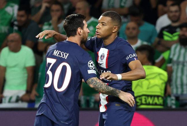 Kylian Mbappe celebrates with PSG teammate Lionel Messi. Image: Alamy