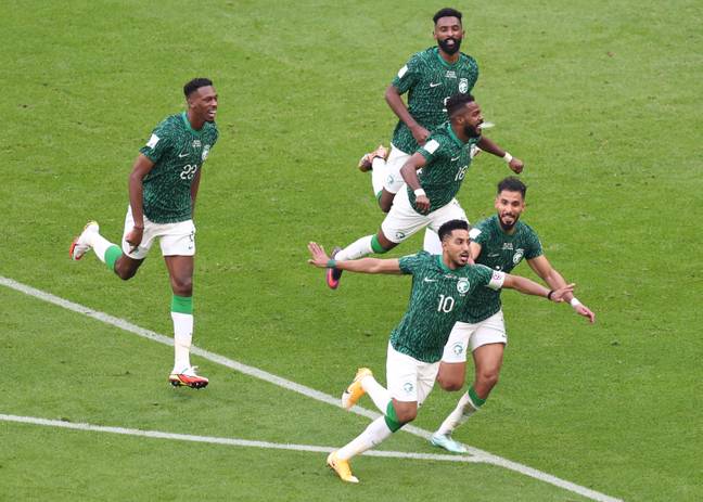 Al-Dawsari and other Saudi players celebrate his winner. (Image Credit: Alamy)