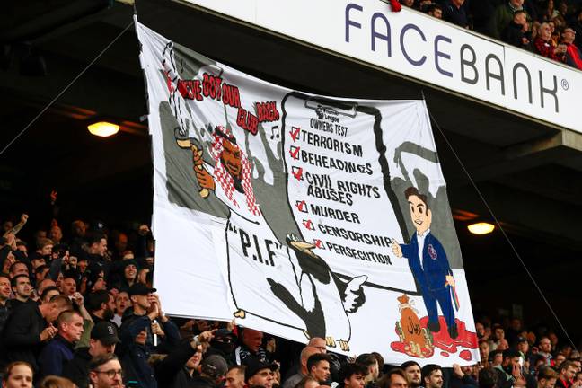 Crystal Palace fans protesting Newcastle's owners last season. Image: Alamy
