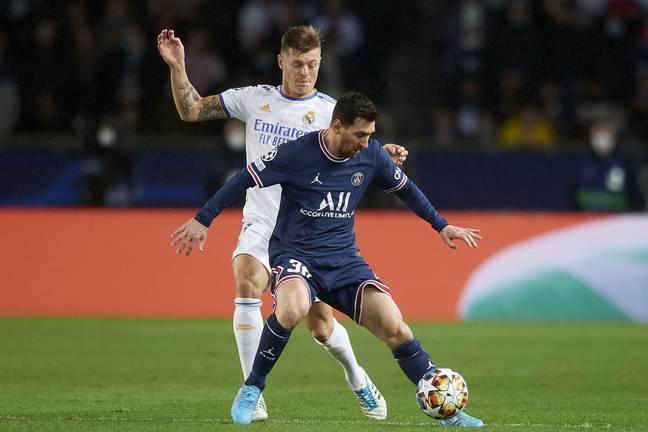 Kroos attempts to dispossess Messi during Real Madrid's Champions League game with Paris Saint-Germain last season. (Image Credit: Alamy)