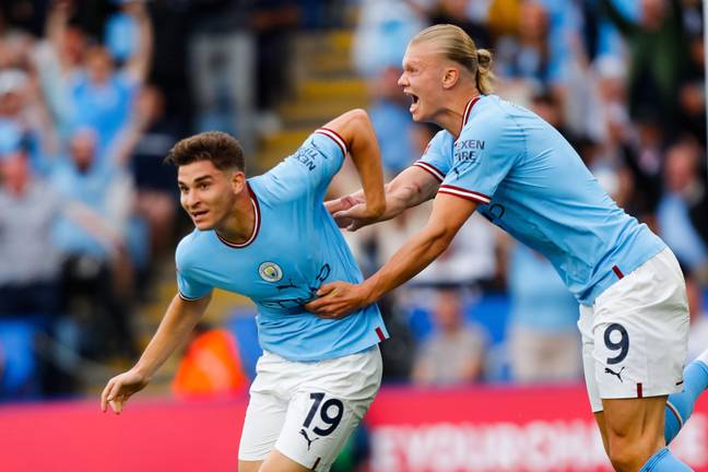 Erling Haaland and Julian Alvarez of Manchester City celebrate. Action Plus Sports Images / Alamy