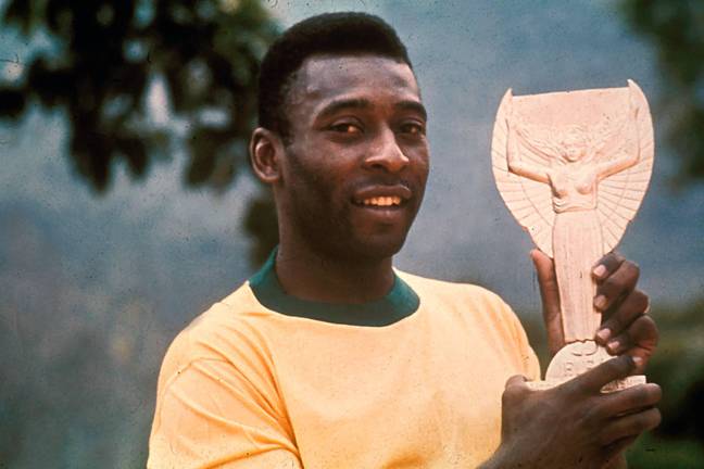 Pele with the Jules Rimet trophy which Brazil were awarded permanently after winning it for the third time in 1970. Image: Alamy