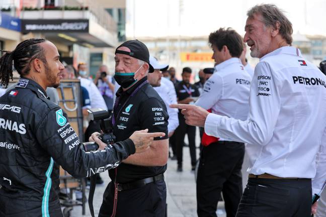 Hamilton and Ratcliffe speaking at a Grand Prix weekend. Image: Alamy