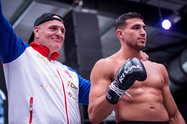 Tommy Fury with dad John. Image: Alamy