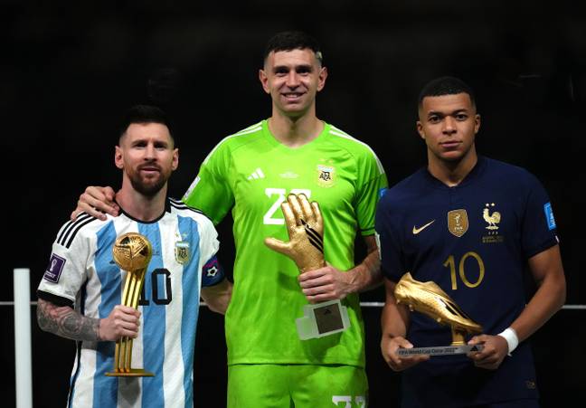 Mbappe with his Golden Boot alongside Lionel Messi and Emiliano Martinez, who won the Golden Ball and Golden Glove. (Image: Alamy)