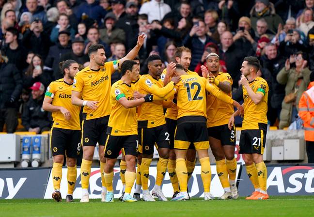 Wolves players celebrate Dawson's goal. (Image Credit: Alamy)