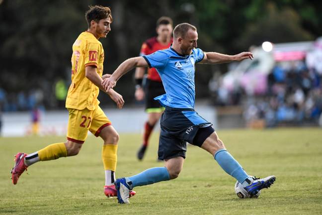 Josh Cavallo (left) is currently the only openly gay professional footballer in the world (Image: PA)