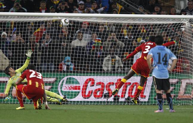 Gyan's penalty thumps against the bar. Image: PA Images