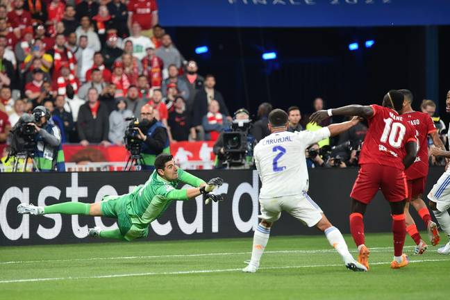 Courtois made a series of impressive saves against Liverpool (Image: PA)