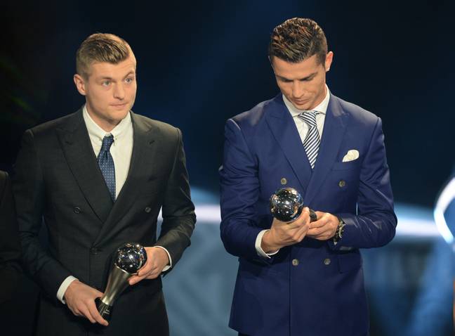 Ronaldo trying to work out how many more 'World Player of the Year' trophies he has than Kroos. Image: Alamy