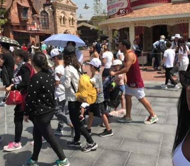 Tevez was spotted at Disney whilst his team played without him. Image: Twitter