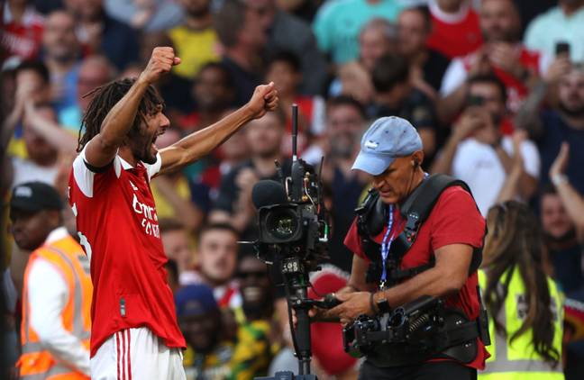 Mohamed Elneny celebrates in front of the fans after Arsenal's winning goal. Image: Alamy