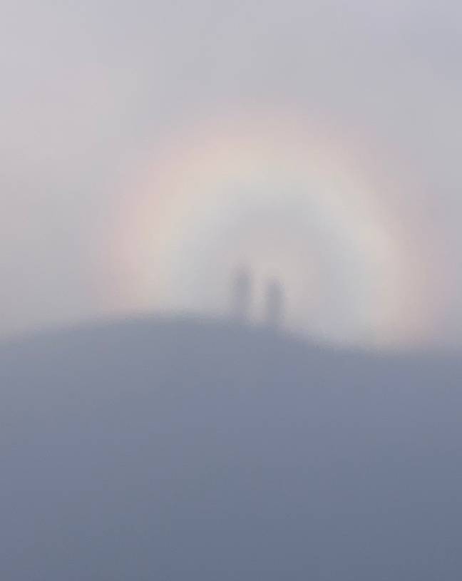 Another recent sighting of Brocken spectres - this time, framed by a rainbow. Credit: Twitter / ruthlady
