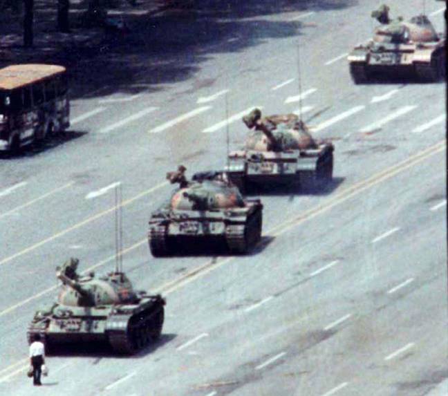 A Beijing citizen stands in front of tanks on the Avenue of Eternal Peace in this June 5, 1989. Credit: Alamy
