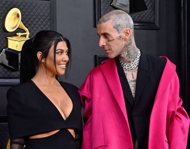 Kourtney Kardashian and Travis Barker arrive for the 64th annual Grammy Awards at the MGM Grand Garden Arena in Las Vegas, Nevada. Credit: Alamy