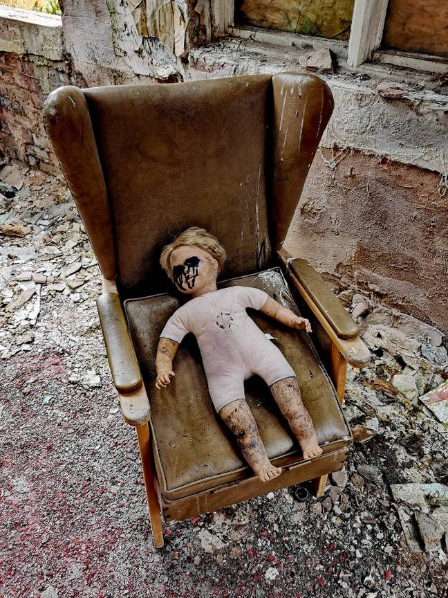 Kyle found a seriously creepy doll lurking in the abandoned hospital. Credit: Kyle Urbex