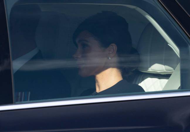 Meghan, travelling separately from Kate. Credit: Doug Peters / Alamy 