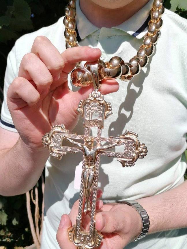 Andreo Montanino bought the gigantic crucifix and chain in honour of his late Roman Catholic grandmother. Credit: SWNS