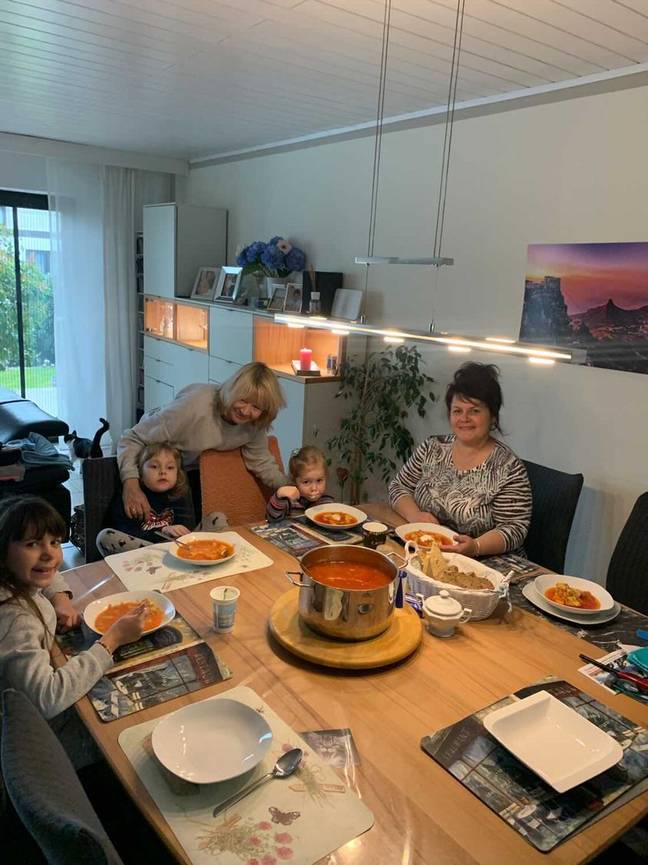 Doris (centre) has taken Julia and her family into her home. Credit: Supplied 