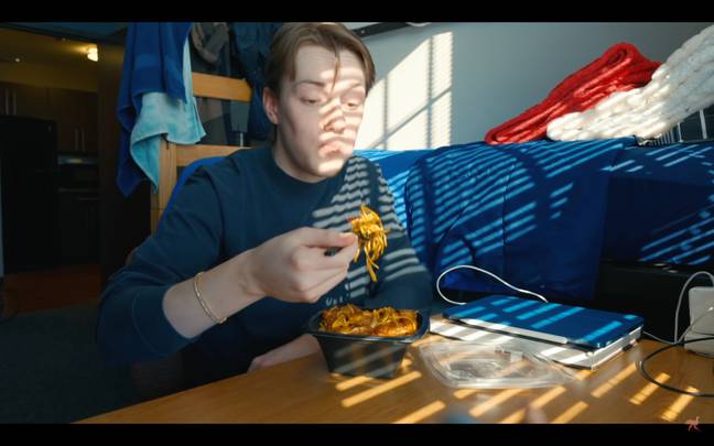 The actor playing JC eating his noodles. Credit: YouTube