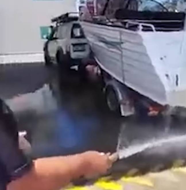 The fisherman had to hose down his boat to clean out all the petrol. Credit: 9News