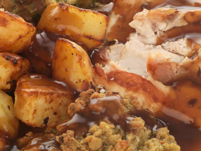 Roast potatoes and stuffing are usually a staple on the roast dinner plate. Credit: David Lee / Alamy Stock Photo