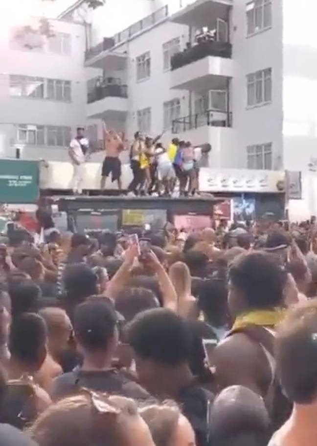 People were seen dancing on a bus shelter during the celebrations. Credit: Twitter