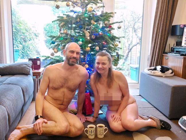Helen Berriman and her husband Simon celebrate Christmas in the buff. Credit: Caters