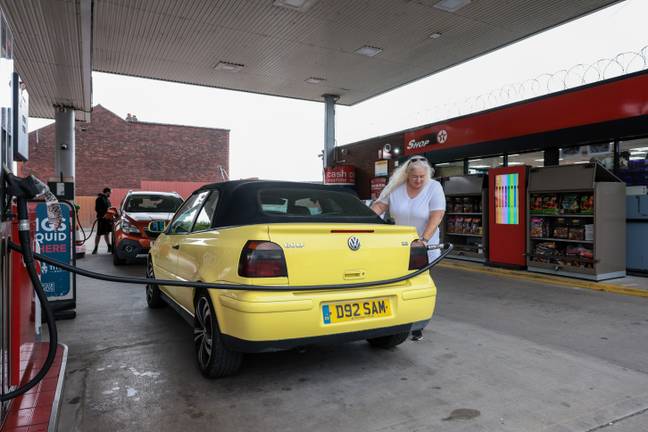 A woman filling up at the Limes Service Station. Credit: MEN Media